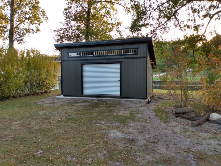 12x20 LT Painted Burnished Slate with Black trim Black Metal 9x7 roll up door 12inch overhangs 5 transom windows Jeanine Zimmerman 3
